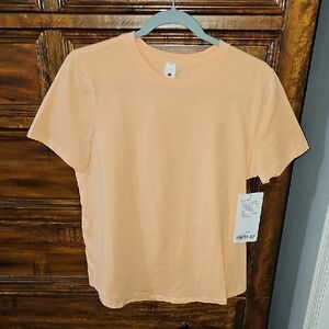 Lululemon Love Crew Sz 8 Short Sleeve Shirt. Hip Length. PCHB. Peach Bellini!